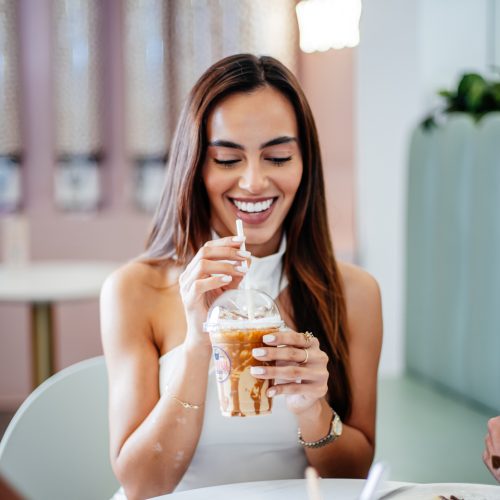 girl-smiling-iced-coffee